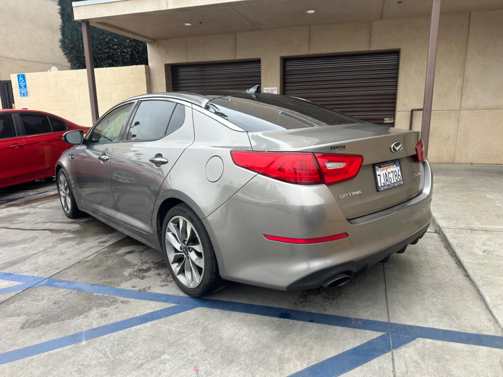 2014 Gray /BLACK Kia Optima SX Turbo (5XXGR4A62EG) with an 2.0L L4 DOHC 16V TURBO engine, 6-Speed Automatic transmission, located at 30 S. Berkeley Avenue, Pasadena, CA, 91107, (626) 248-7567, 34.145447, -118.109398 - New tires! Moon Roof! Nice Interior! Looks and drives good! Bad credit? We can help! We are the bank. All our cars are thoroughly inspected and reconditioned by our technicians. FREE CARFAX report. Stop by or call to speak with our friendly staff. Whether you have bad credit, no credit, bankruptcy, - Photo #2